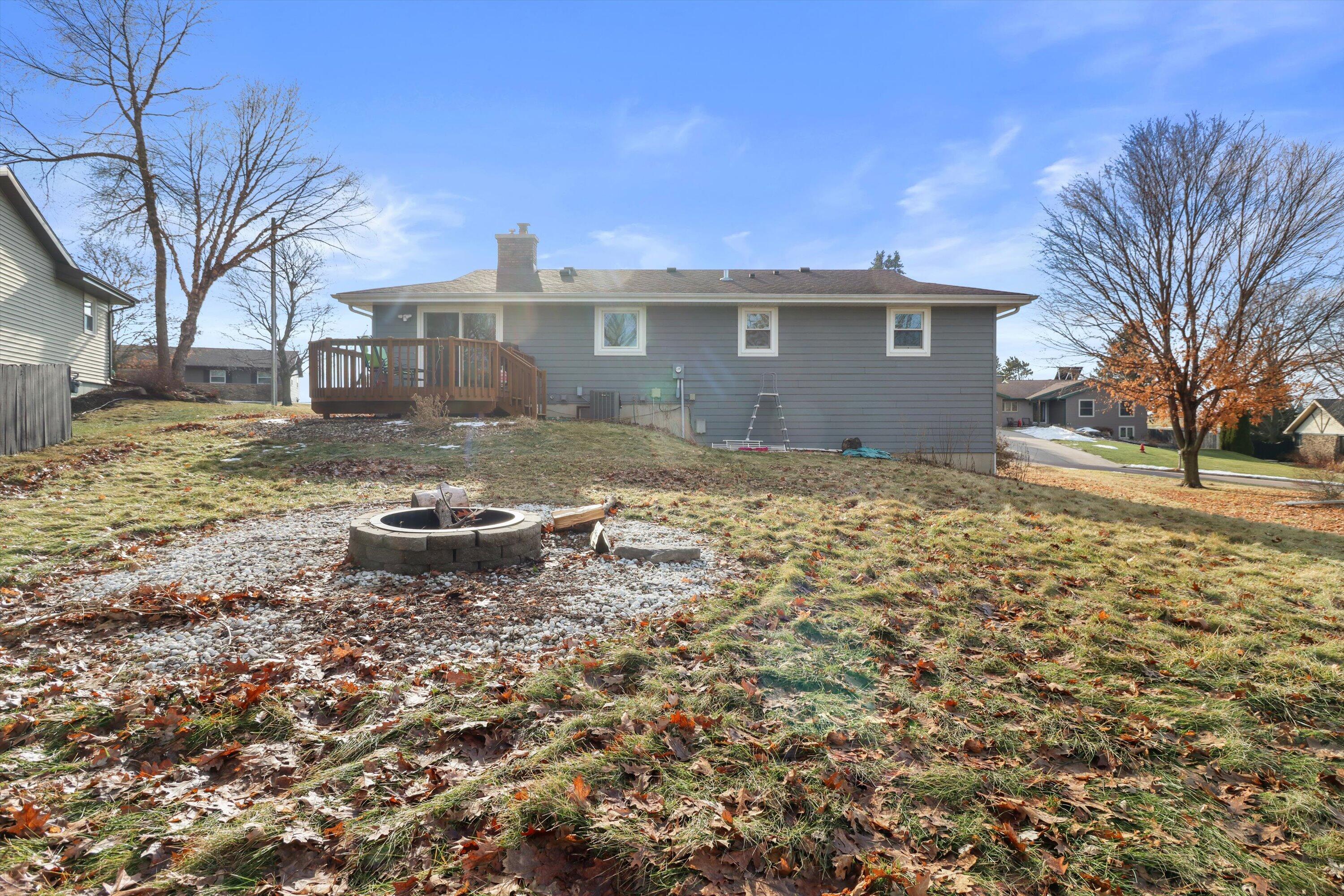 105 Winston Way Waunakee, WI 53597 - Photo 34 of 35 Backyard Area with Firepit
