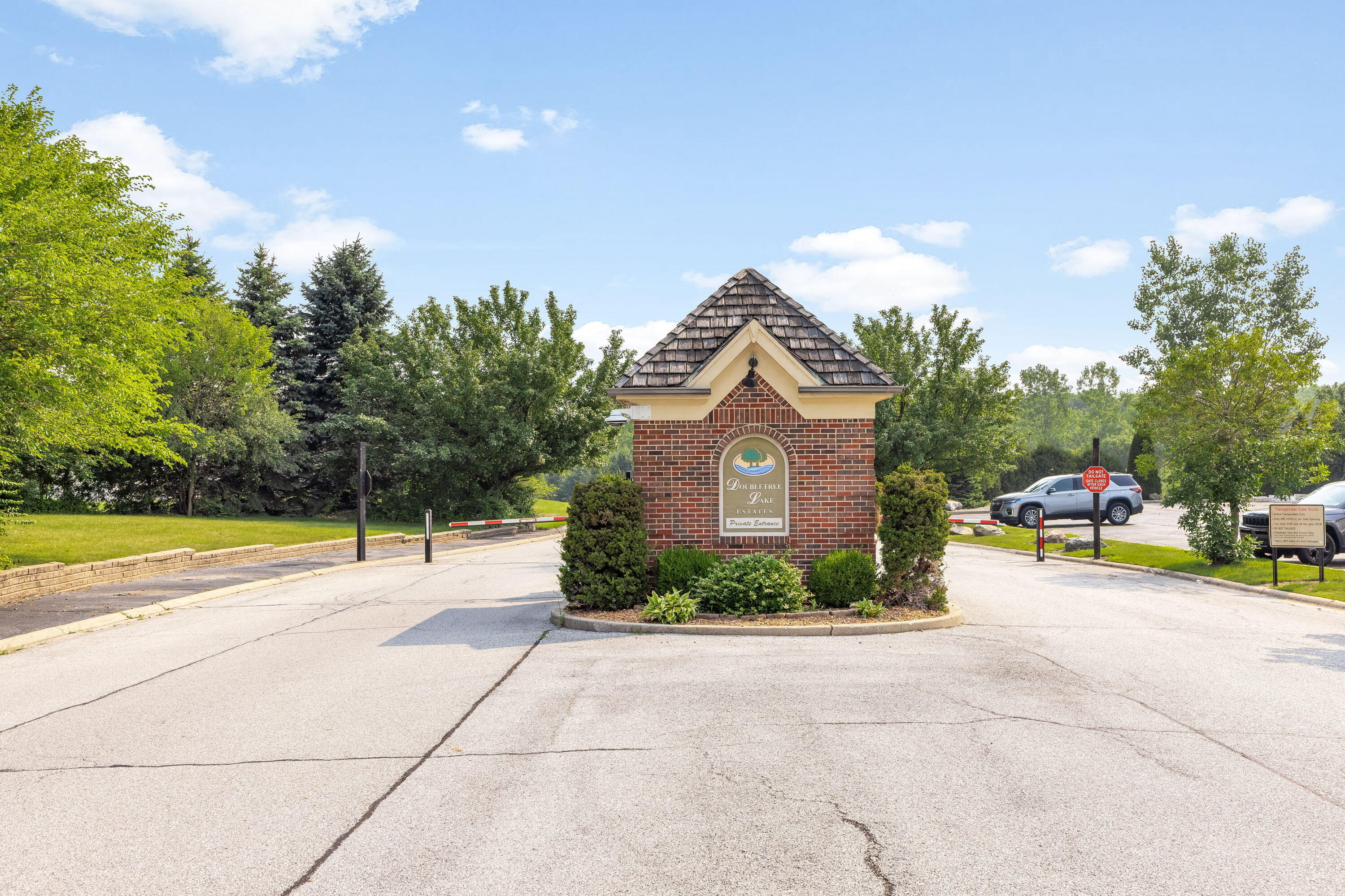 8160 Lakeview Court Winfield, IN 46307 - Photo 16 of 27 a view of a house with a yard and potted plants