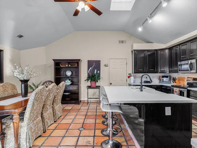 a view of a dining room with furniture