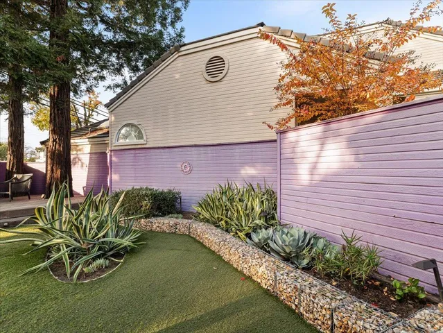 a water fountain in the middle of a lake
