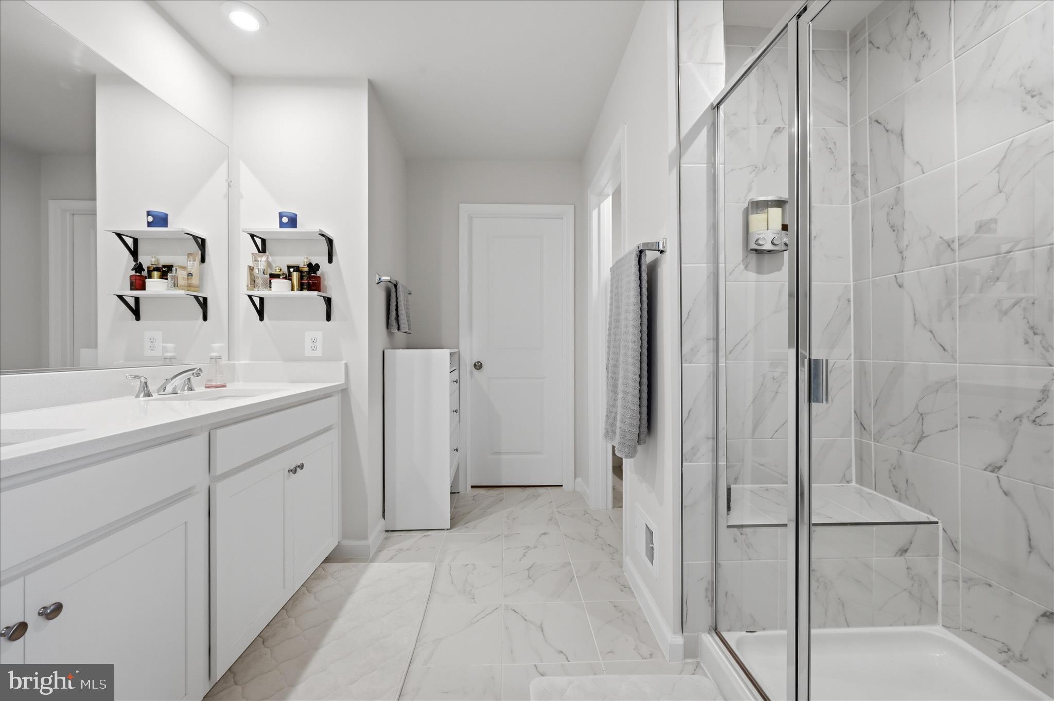 152 National Street Ranson, WV 25438 - Photo 29 of 53 a spacious bathroom with a shower and a sink