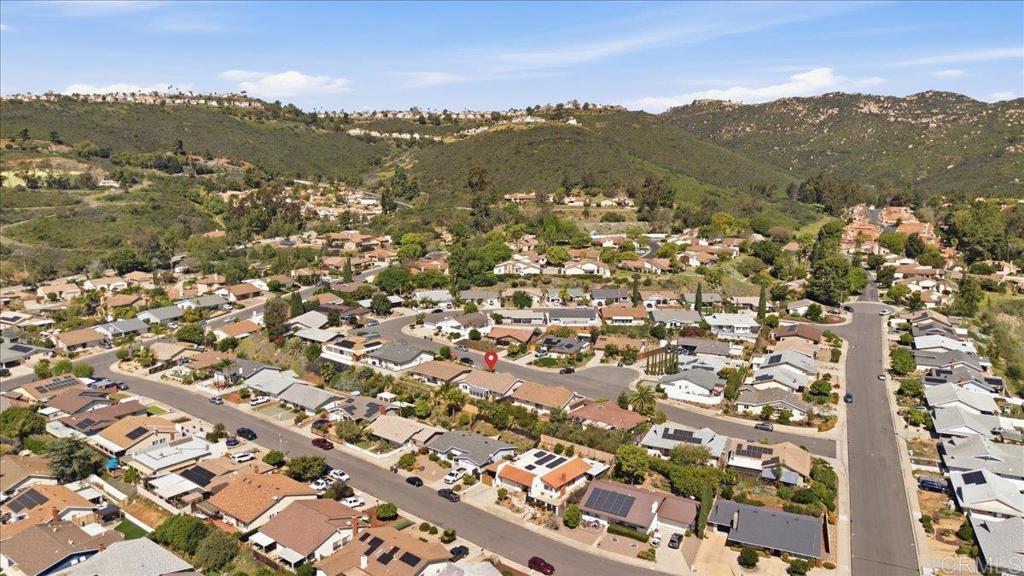 1915 Edith Drive Escondido, CA 92026 - Photo 30 of 41 an aerial view of residential building with parking space