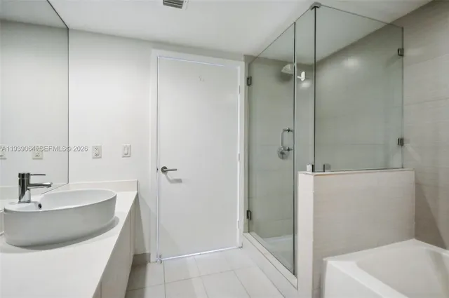 a bathroom with a sink and a tub
