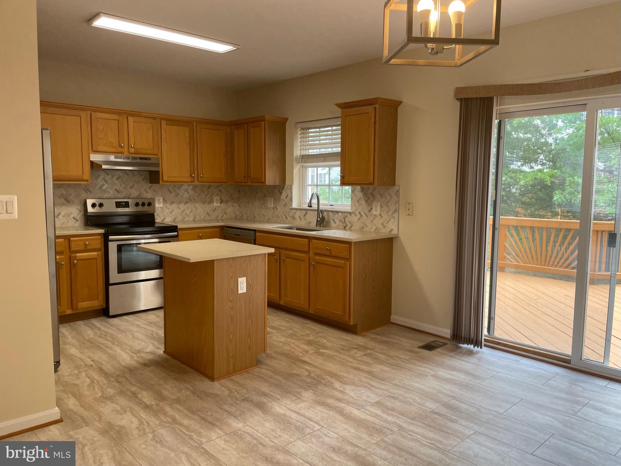 9058 Two Bays Road Lorton, VA 22079 - Photo 13 of 32 Open Kitchen with Table space