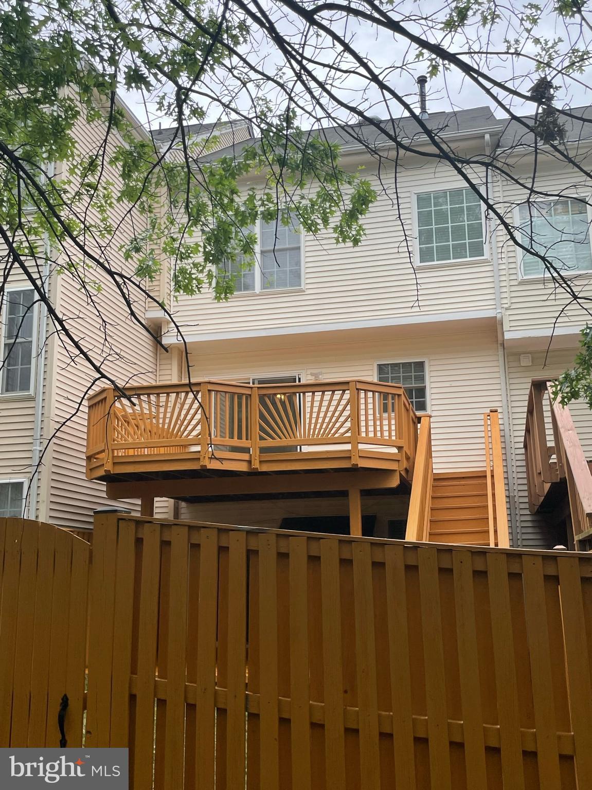 9058 Two Bays Road Lorton, VA 22079 - Photo 2 of 32 Fully fenced backyard, deck with stairs