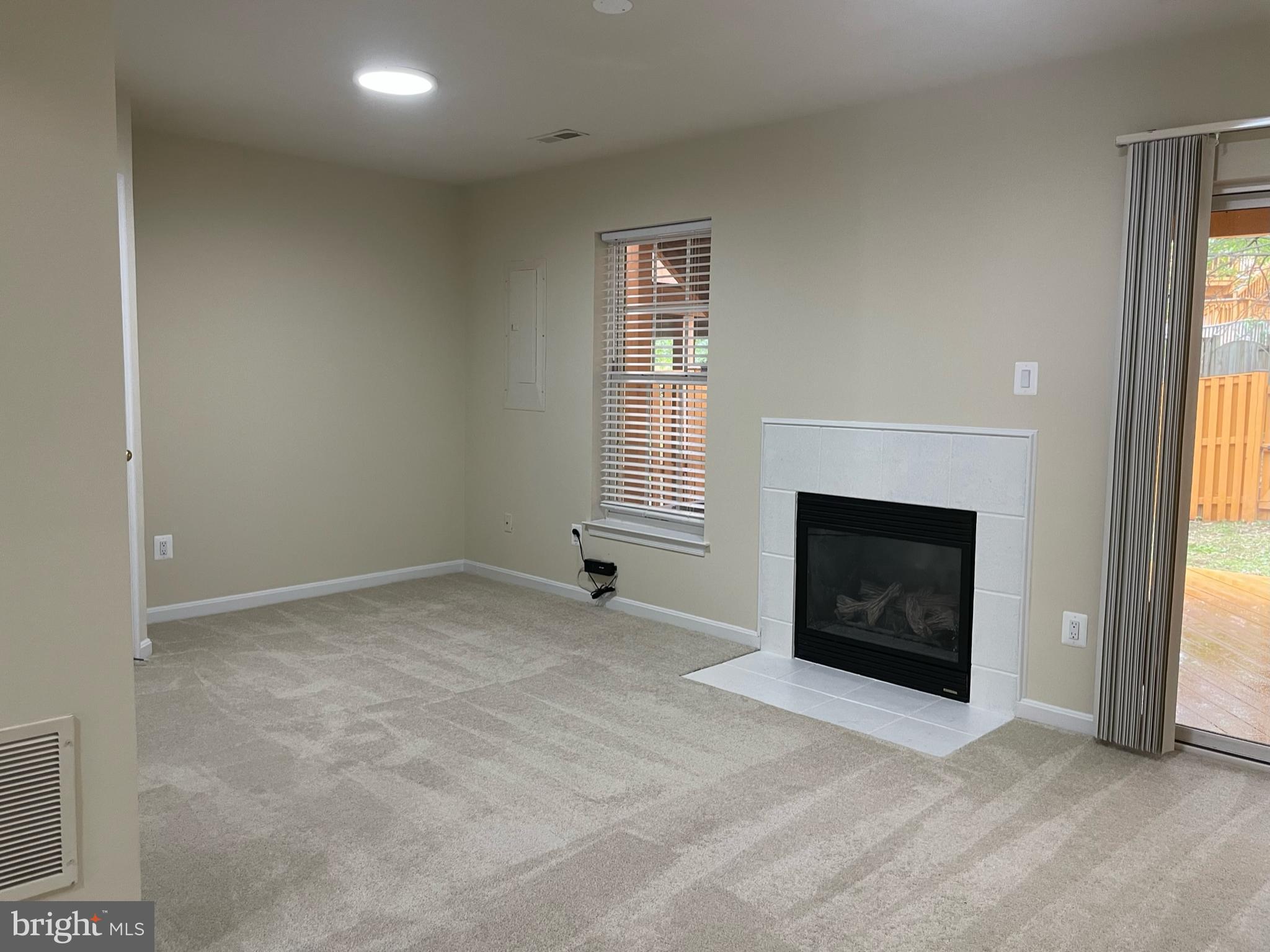 9058 Two Bays Road Lorton, VA 22079 - Photo 3 of 32 Rec room with gas fireplace