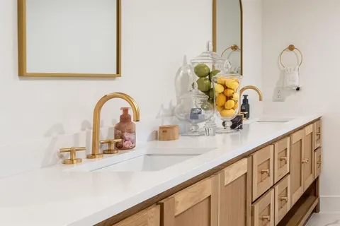 a white bath tub sitting in a bathroom
