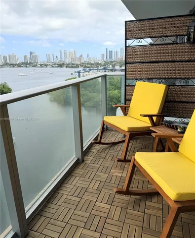 a view of a lake from a balcony
