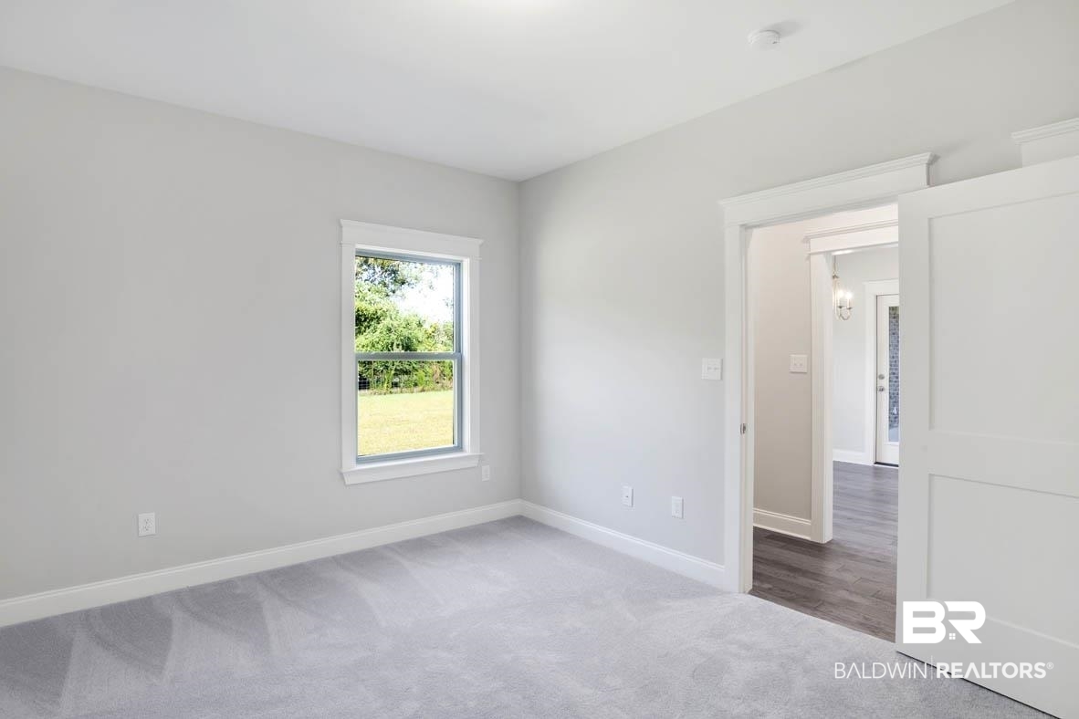 393 Garrison Boulevard Fairhope, AL 36532 - Photo 19 of 40 Spare room featuring carpet floors