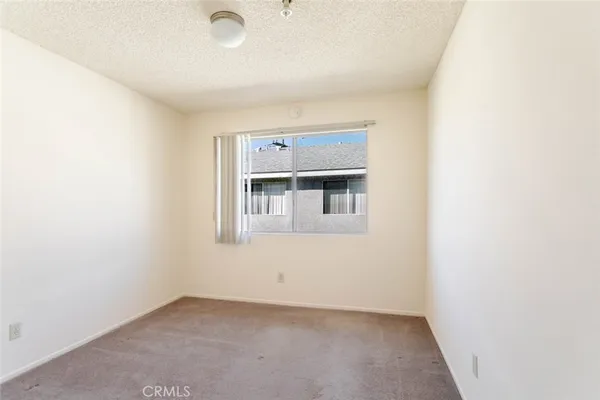 a view of a room with windows