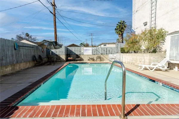 a view of a back yard of the house
