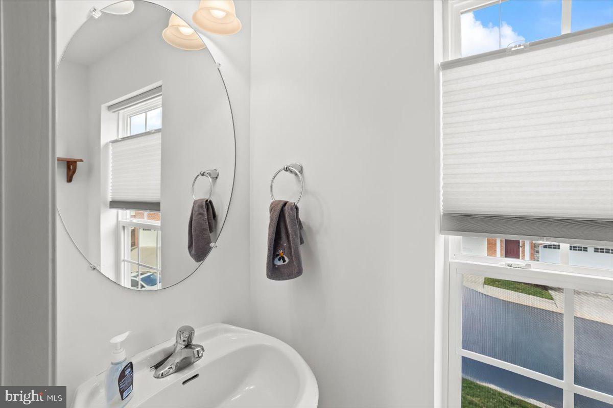 14 Indiana Circle Lemoyne, PA 17043 - Photo 14 of 30 a bathroom with a sink and mirror