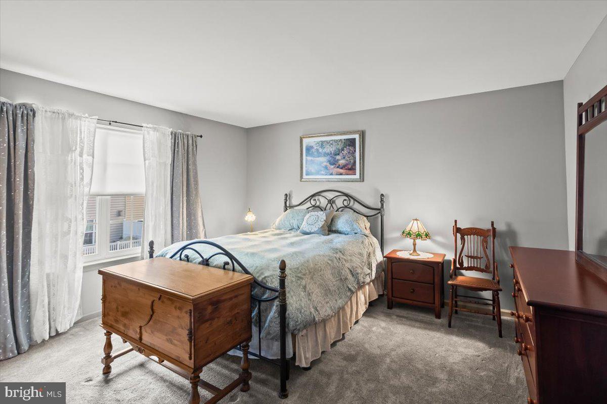 14 Indiana Circle Lemoyne, PA 17043 - Photo 15 of 30 a bed room with a bed and a desk