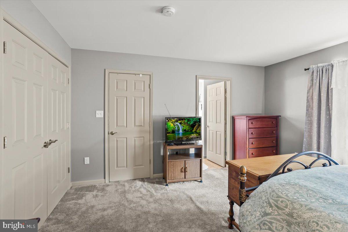 14 Indiana Circle Lemoyne, PA 17043 - Photo 16 of 30 a bedroom with a bed and a dresser