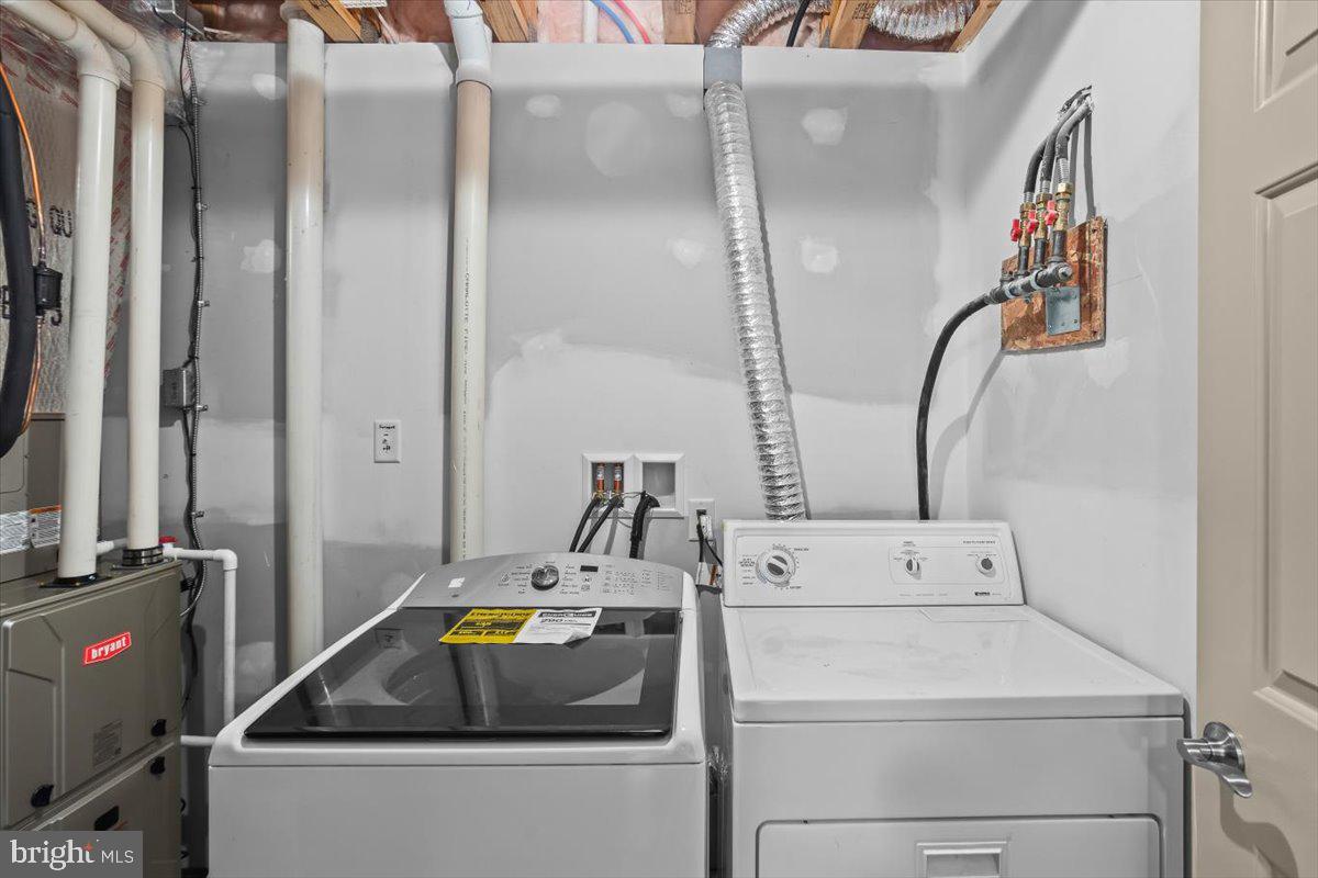 14 Indiana Circle Lemoyne, PA 17043 - Photo 21 of 30 a utility room with dryer and washer