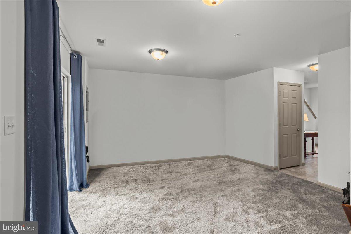 14 Indiana Circle Lemoyne, PA 17043 - Photo 5 of 30 an empty room with a natural light