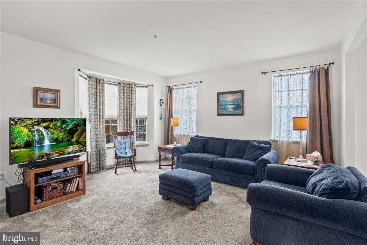 14 Indiana Circle Lemoyne, PA 17043 - Photo 8 of 30 a living room with furniture and a flat screen tv