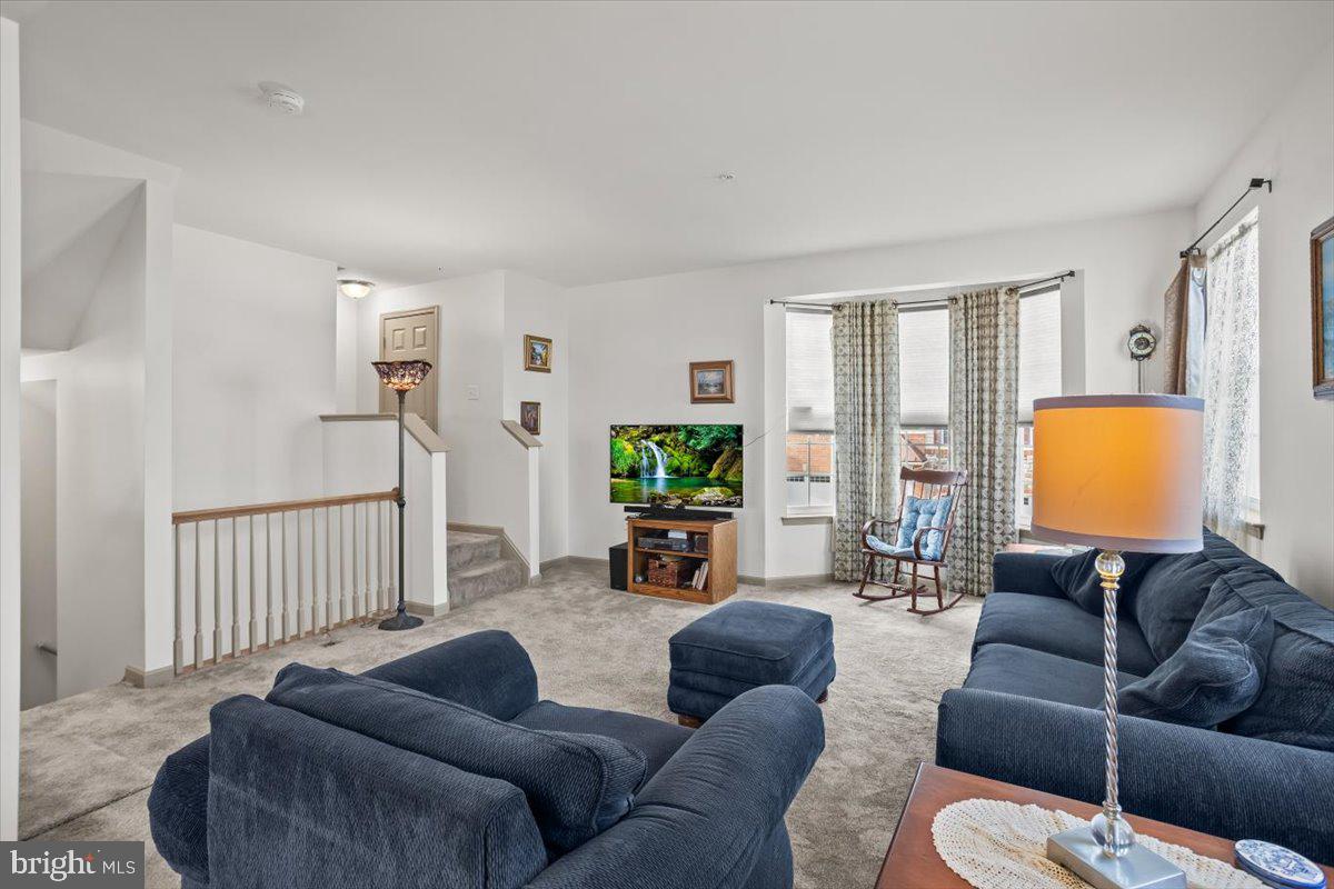 14 Indiana Circle Lemoyne, PA 17043 - Photo 10 of 30 a living room with furniture or couch and a flat screen tv