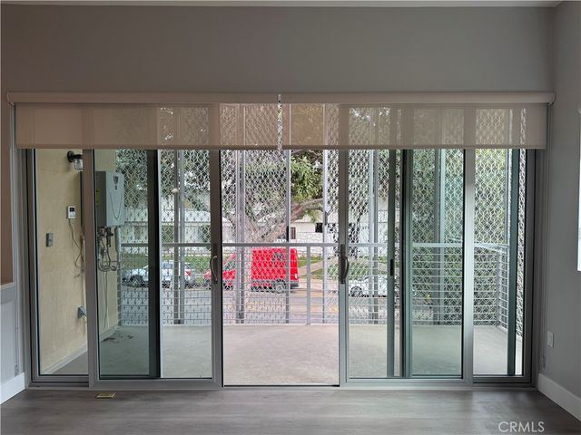 a bathroom with a double vanity sink toilet and mirror