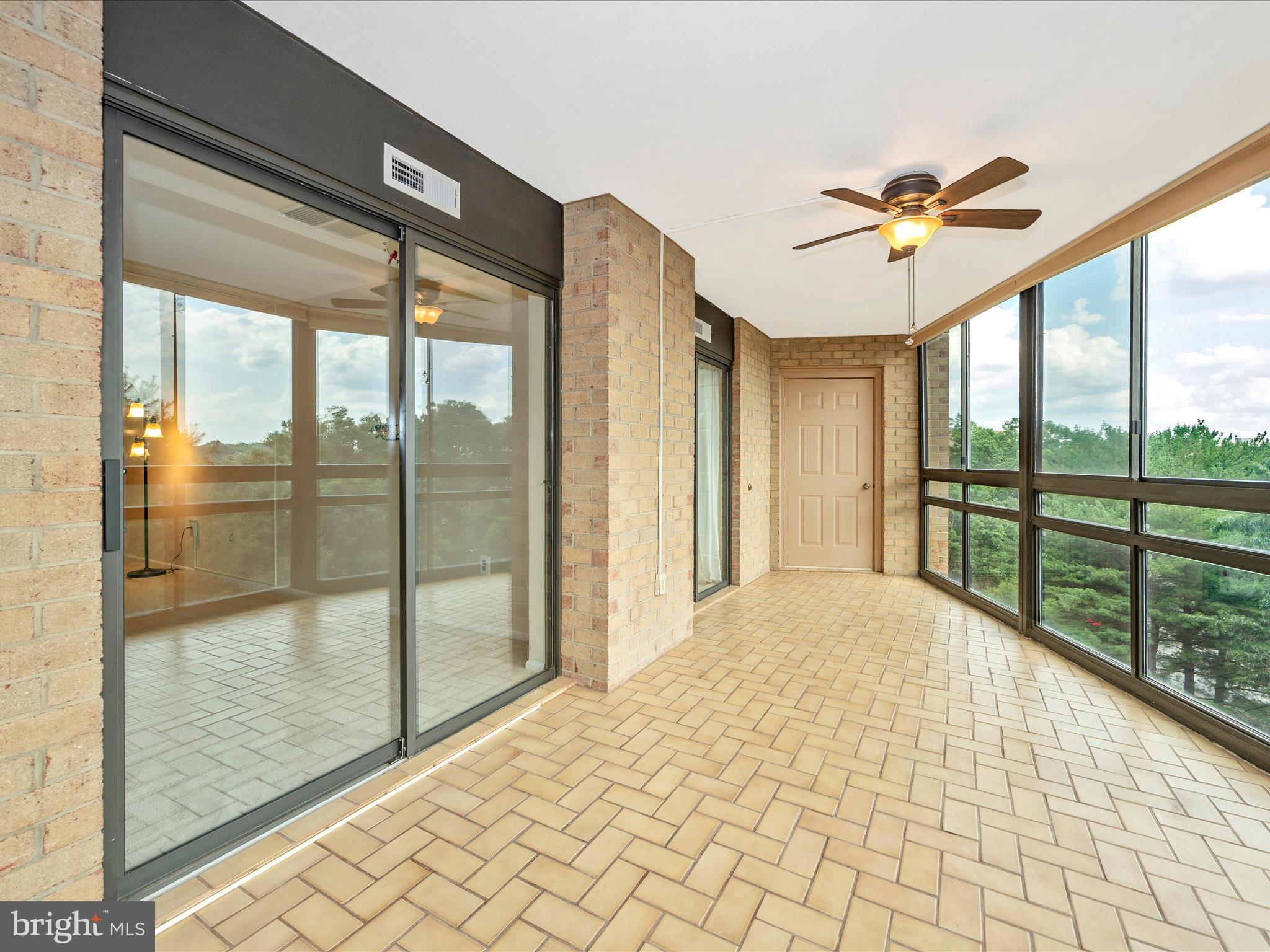 15115 Interlachen Drive, Unit 3704 Silver Spring, MD 20906 - Photo 26 of 72 Sun Room