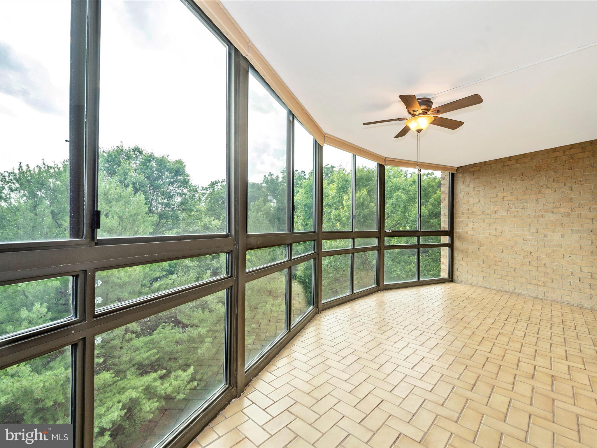 15115 Interlachen Drive, Unit 3704 Silver Spring, MD 20906 - Photo 27 of 72 Sun Room