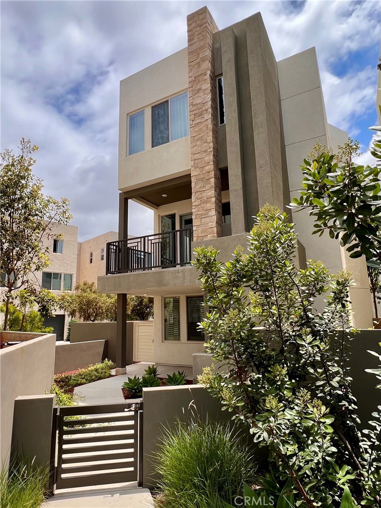 146 Catalyst Irvine, CA 92618 - Photo 1 of 1 a front view of a building with garden