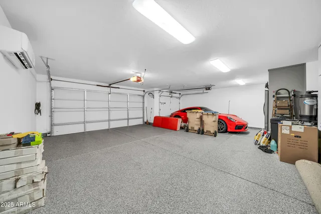 a view of a garage with a car parked garage