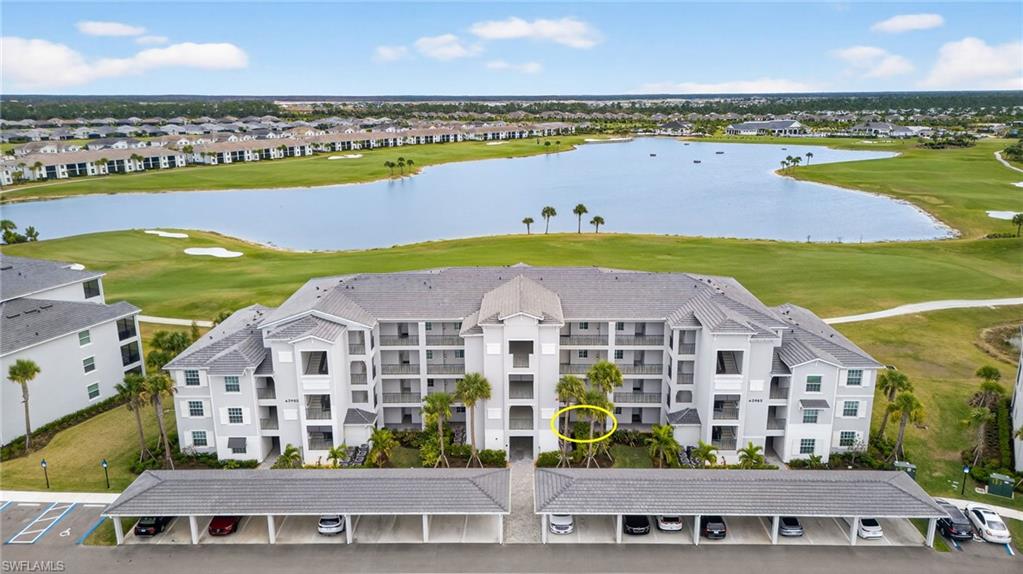 43985 Boardwalk Loop, Unit 2115 Punta Gorda, FL 33982 - Photo 28 of 28 a view of a city with lawn chairs