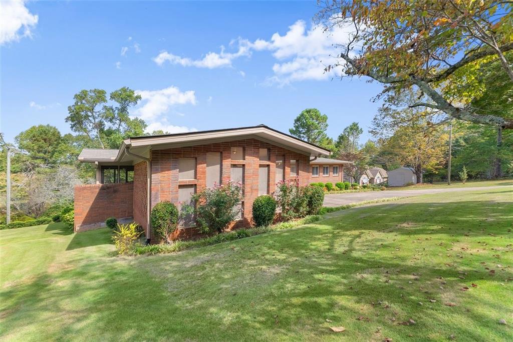 2460 Calvary Church Road Gainesville, GA 30507 - Photo 1 of 1 a front view of a house with garden