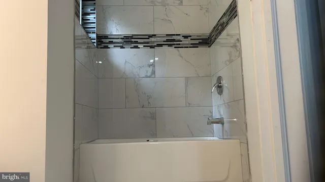 a backyard of a house with lots of green space and trees