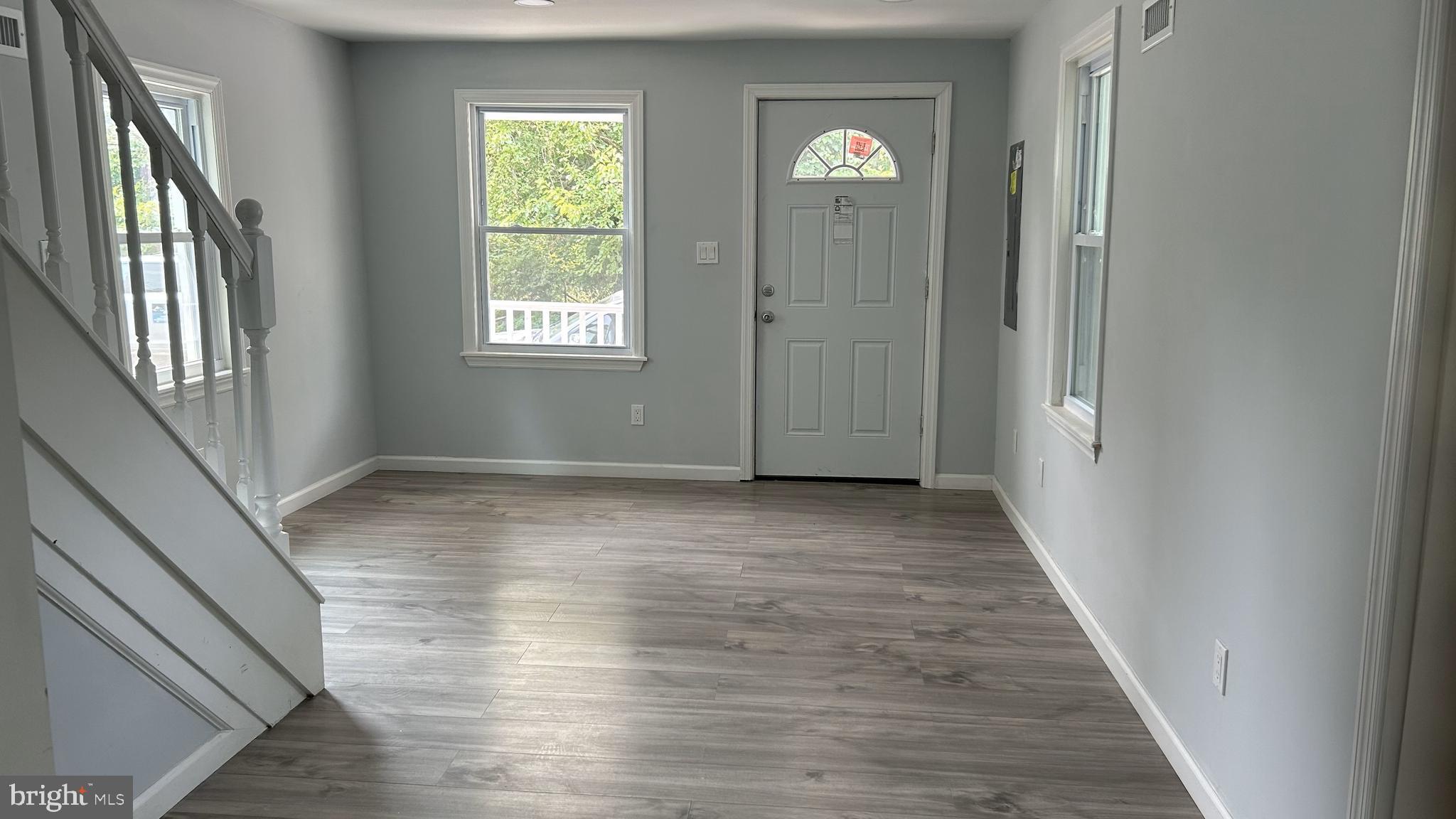 69 Carpenter Street Salem, NJ 08079 - Photo 4 of 29 a view of entryway with wooden floor