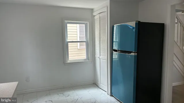 a view of refrigerator and window