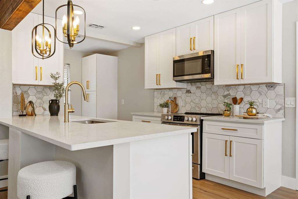 2912 Robindale Lane Grapevine, TX 76051 - Photo 3 of 29 With Brand New Kitchen with Quartz Counters
