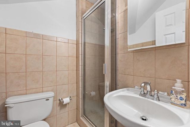 a bathroom with a sink and toilet