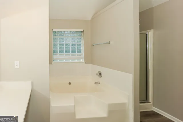 a bathroom with a bathtub