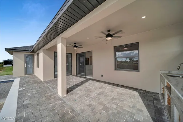 a view of a hallway with a chandelier