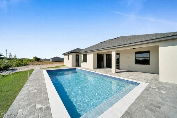 swimming pool view with a outdoor space