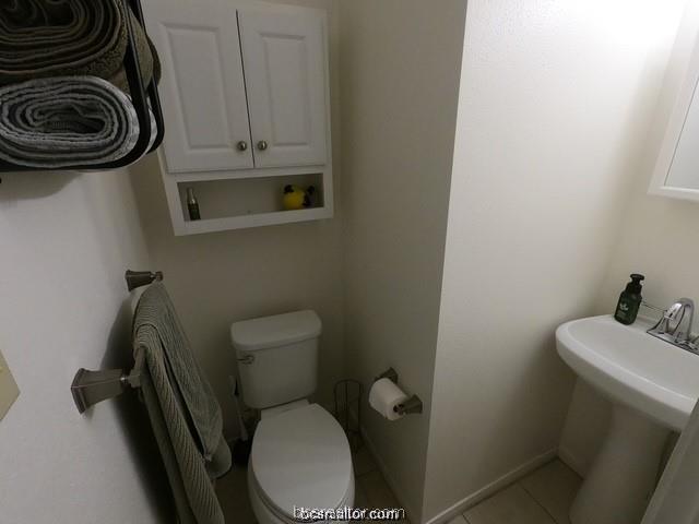 4200 Culpepper Drive Bryan, TX 77801 - Photo 11 of 18 a bathroom with a toilet and a sink