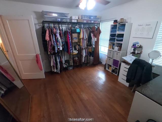 4200 Culpepper Drive Bryan, TX 77801 - Photo 13 of 18 a view of walk in closet with clothes and shoes