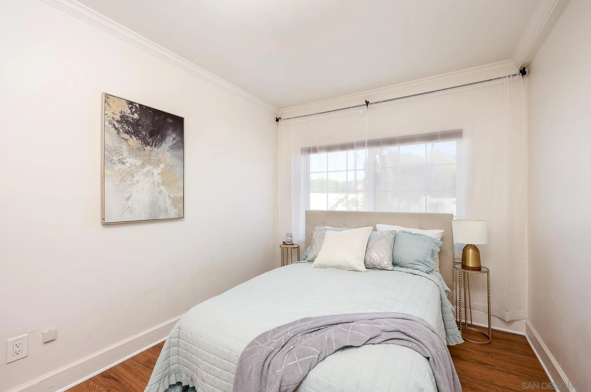 2146 El Pasillo Lane Spring Valley, CA 91977 - Photo 12 of 30 a bedroom with a bed and a window