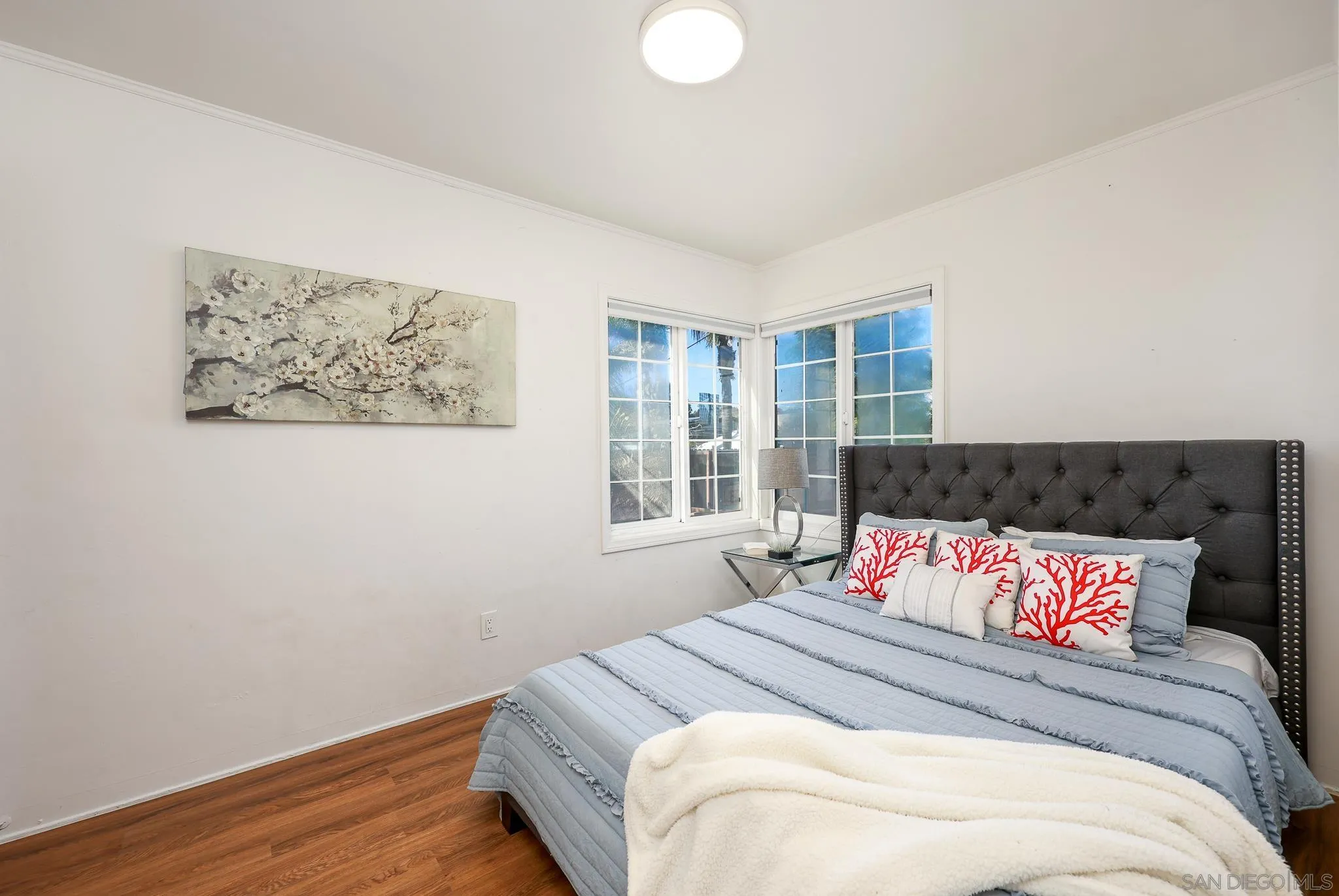 2146 El Pasillo Lane Spring Valley, CA 91977 - Photo 15 of 30 a bedroom with bed and wooden floor