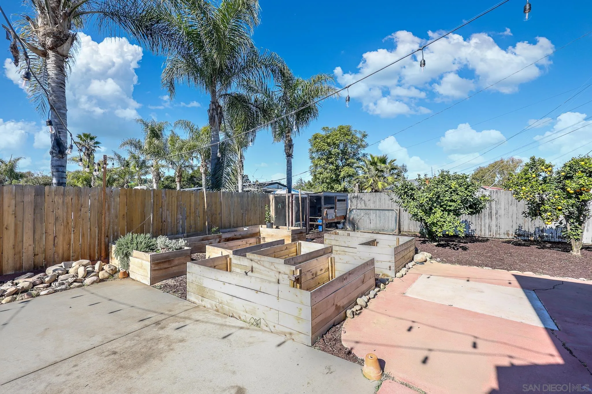 2146 El Pasillo Lane Spring Valley, CA 91977 - Photo 19 of 30 a view of a backyard with sitting area