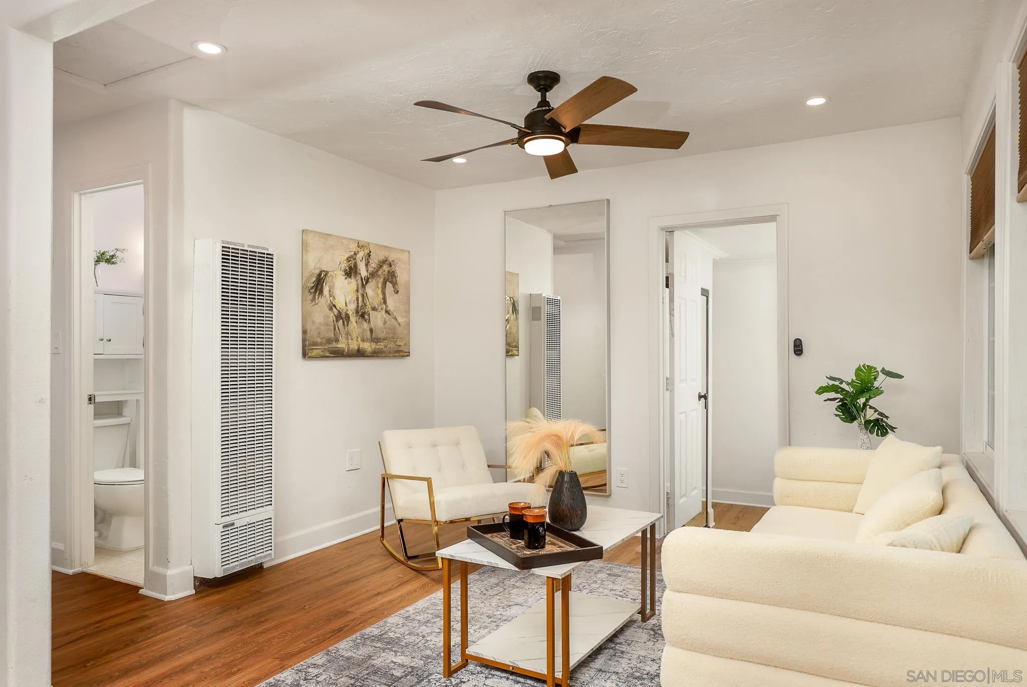 2146 El Pasillo Lane Spring Valley, CA 91977 - Photo 4 of 30 a living room with furniture and a window