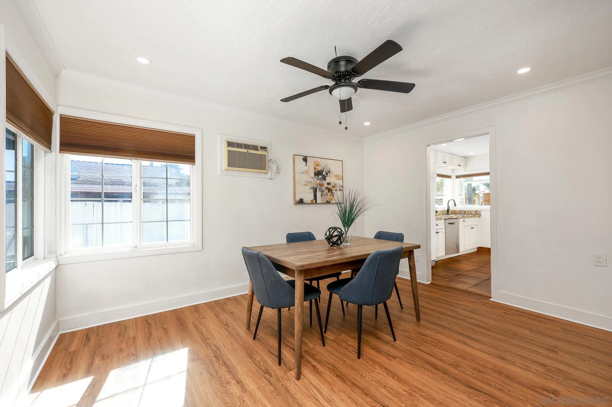 2146 El Pasillo Lane Spring Valley, CA 91977 - Photo 5 of 30 a view of a dining room with furniture window and wooden floor