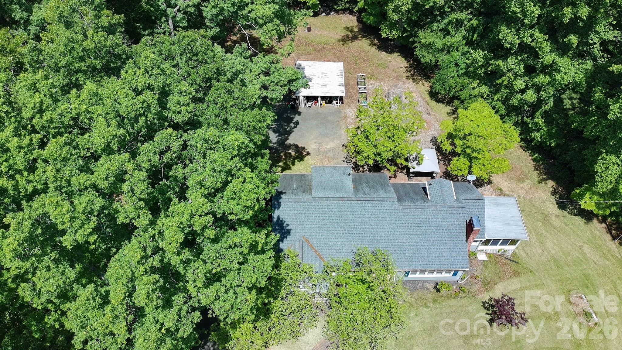 951 Dodson Mill Road Pilot Mountain, NC 27041 - Photo 41 of 48 an aerial view of a house with a yard