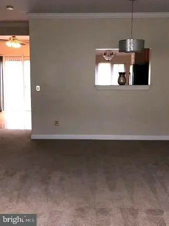 a view of a refrigerator in a room