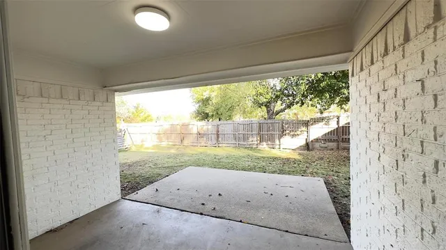 a view of backyard with green space