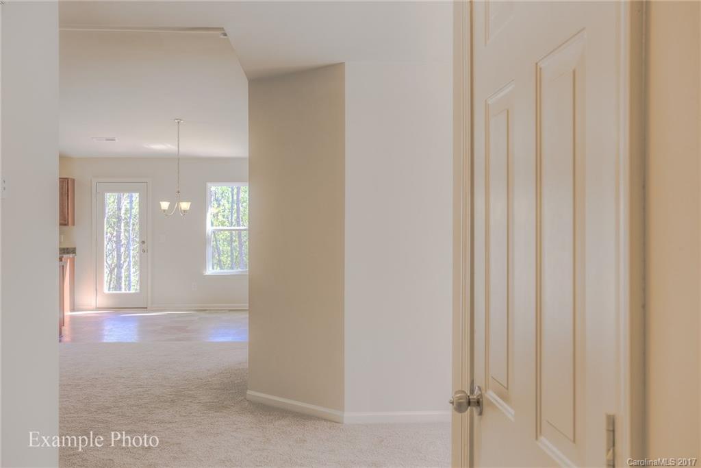 2119 Gunnars Ridge Road, Unit 17 Lancaster, SC 29720 - Photo 4 of 24 a view of livingroom with hardwood floor and front door