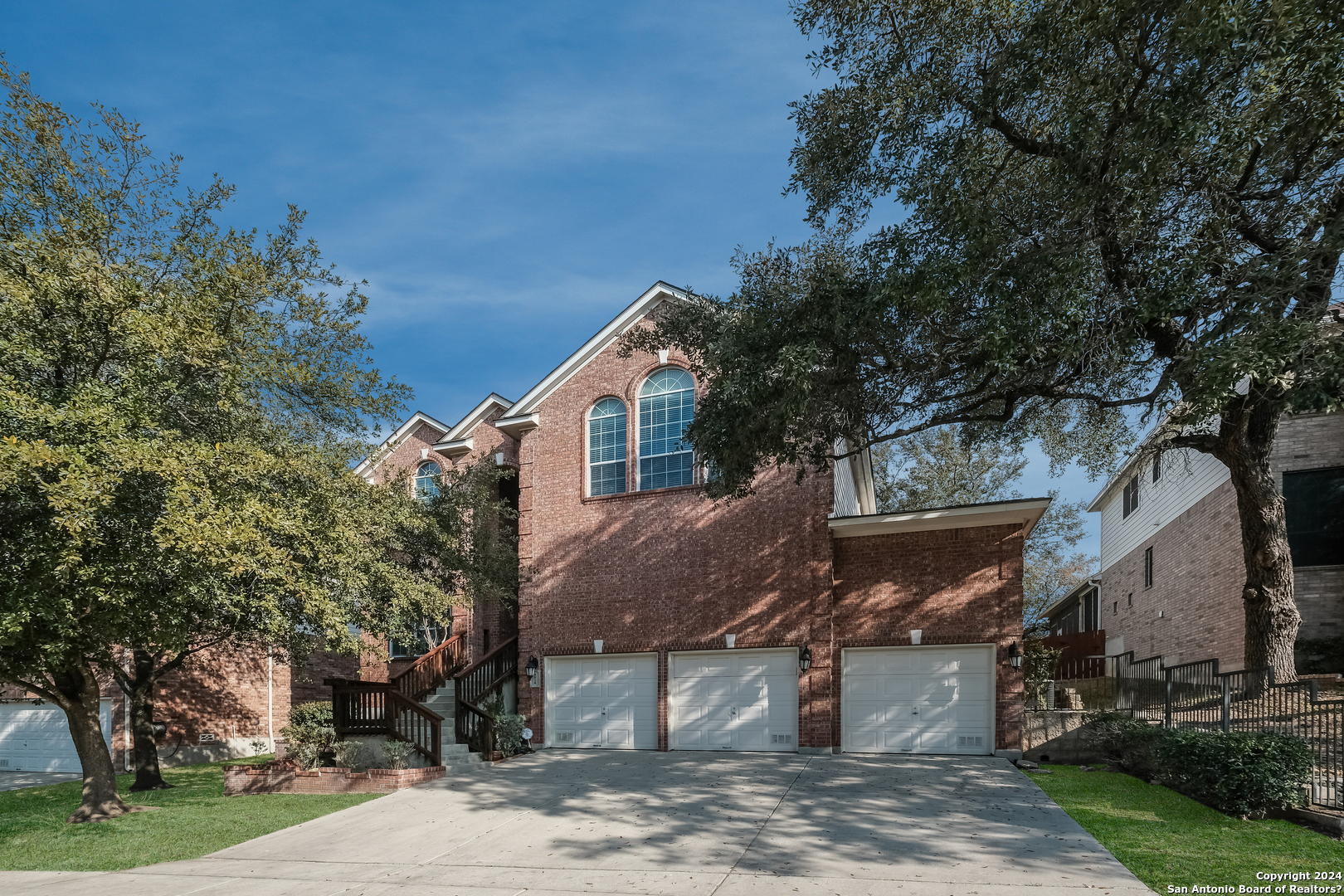 4814 Ranchers Ridge San Antonio, TX 78251 - Photo 1 of 1 a front view of a house with a garden