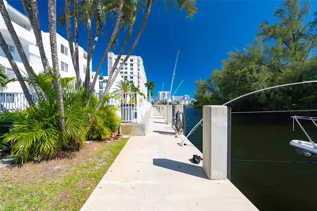 a view of a backyard with sitting area